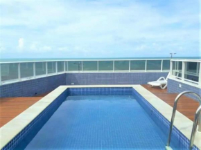 Cabo Branco, pé na areia, ao lado do bar do cuzcuz